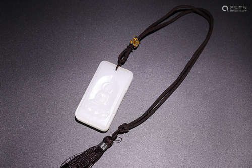 A BUDDHA PATTERN HETIAN JADE PENDANT