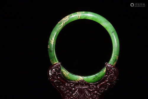 AN OLD FLORAL AND BUTTERFLY PATTERN HETIAN JADE BRACELET