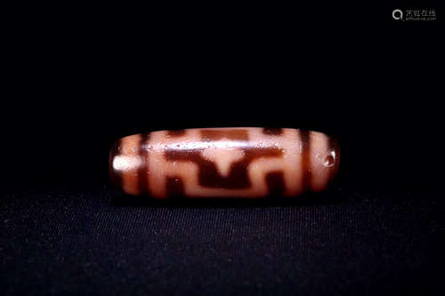 AN OLD TIBETAN CINNABAR DZI-BEAD