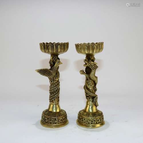 A Pair of Chinese Gilt Bronze Candle Holders