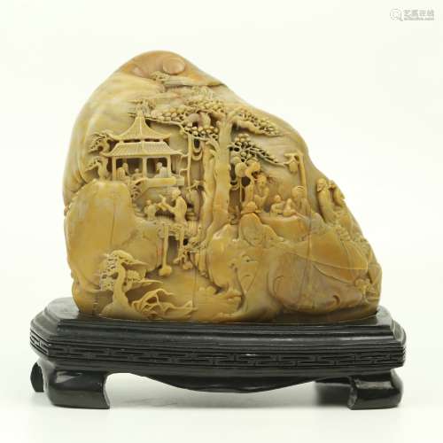 A Chinese Carved Shoushan Decoration with Wood Base