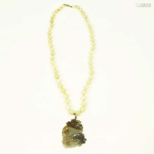 A Chinese Carved Jade Necklace