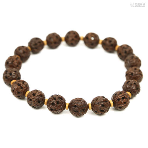A Chinese Carved Wood Bracelet