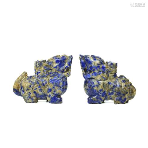 A Pair of Chinese Carved Lapis Foo-Dog Decorations