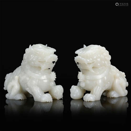 PAIR OF CHINESE JADE LIONS