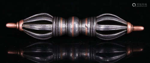 A TIBETAN IRON CASTED BUDDHIST VAJRA