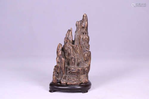 A CHENXIANG WOOD CARVED MOUNTAIN SHAPED PENDANT