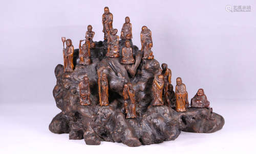 A BAMBOO CARVED EIGHTEEN LUOHAN BUDDHA