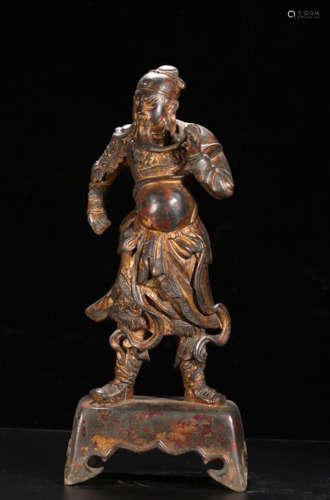 A GILT BRONZE CASTED GUANGONG SHAPED STATUE