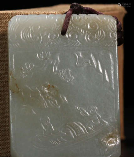 A HETIAN JADE CARVED STORY PATTERN PENDANT