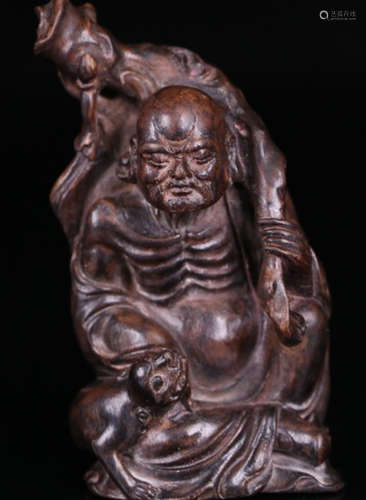 A CHENXIANG WOOD CARVED FUHU LUOHAN BUDDHA