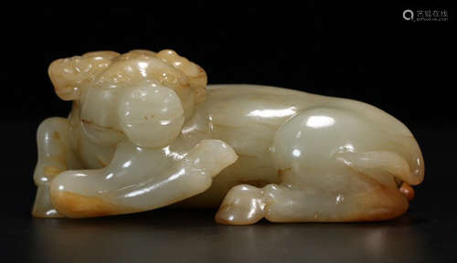 A HETIAN JADE CARVED OX SHAPED PENDANT