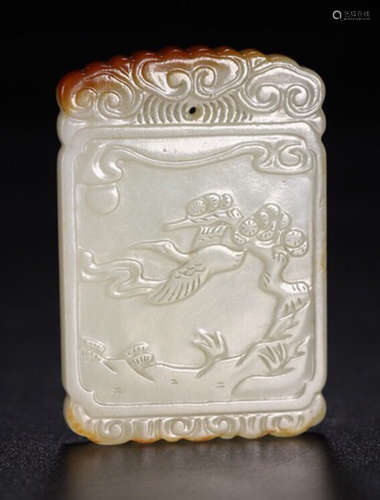 A HETIAN JADE CARVED CLOUD PATTERN PENDANT