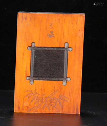 A ZITAN WOOD CARVED YELLOW INK SLAB