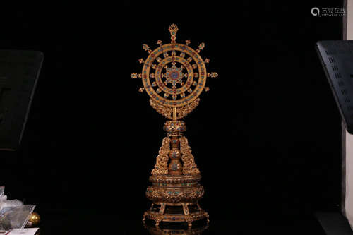 A TIBETAN GILT BRONZE CASTED FA-RECTIFICATION WHEEL