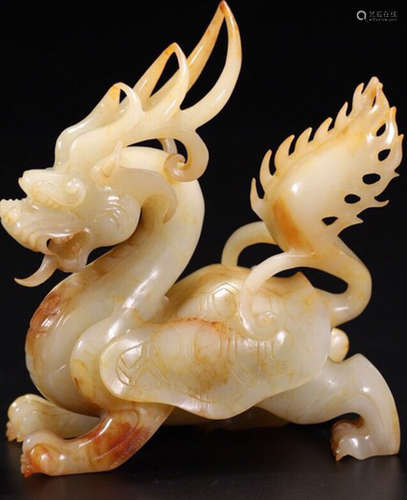 A HETIAN JADE CARVED BEAST SHAPED PENDANT