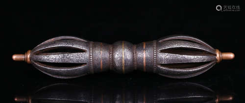 A TIBETAN IRON CASTED BUDDHIST VAJRA