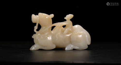 A HETIAN JADE CARVED CAMEL SHAPED PENDANT