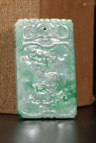 A JADEITE CARVED SHEEP PATTERN PENDANT