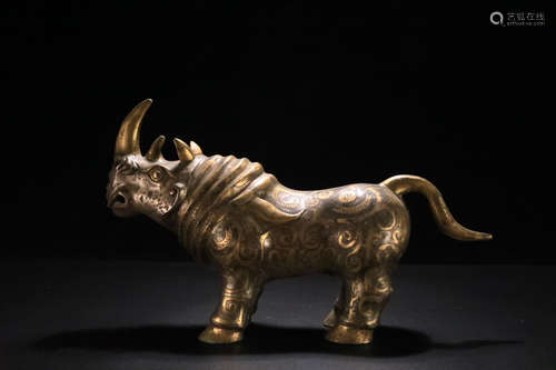 THE PERIOD OF LIAO & JIN, A RHINOCEROS DESIGN GILT BRONZE ORNAMENT