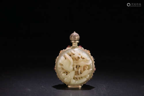 A FLORAL AND BIRD PATTERN HETIAN JADE SNUFF BOTTLE