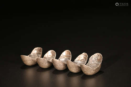 A FIVE-PIECE SILVER INGOT