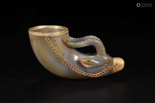 A GILT AGATE CUP OF GOAT SHAPED