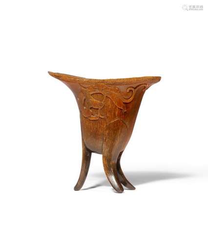 Λ A CHINESE RHINOCEROS HORN TRIPOD LIBATION CUP 17...;