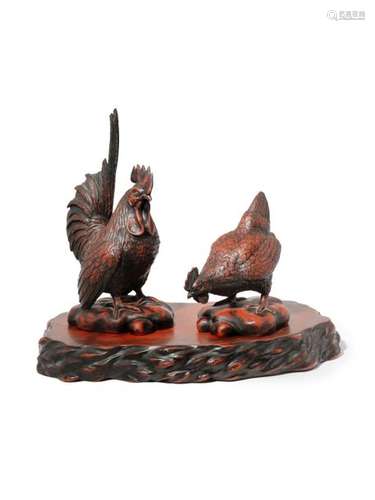 A PAIR OF JAPANESE RED LACQUER MODELS OF CHICKENS ...;