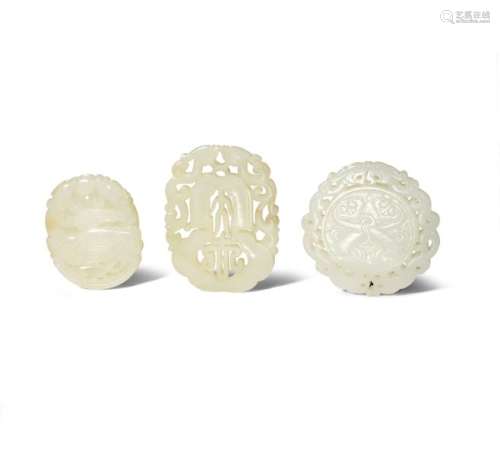 THREE CHINESE JADE PENDANTS QING DYNASTY Two pale ...;