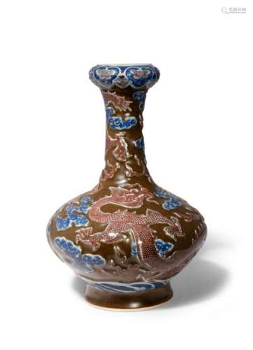 A CHINESE TEADUST AND UNDERGLAZE BLUE AND RED GARL...;