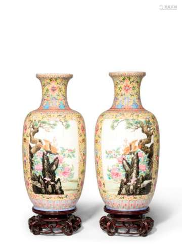 A PAIR OF CHINESE FAMILLE ROSE YELLOW GROUND EGGSH...;