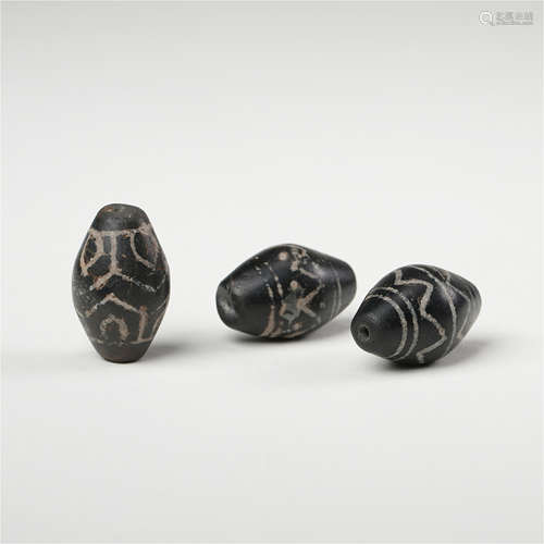 TWO CHINESE DZI BEADS TAND DYNASTY