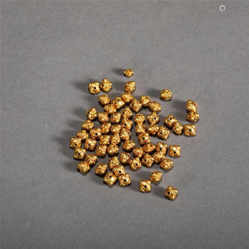 A GROUP OF CHINESE PURE GOLD BEADS TANG DYNASTY