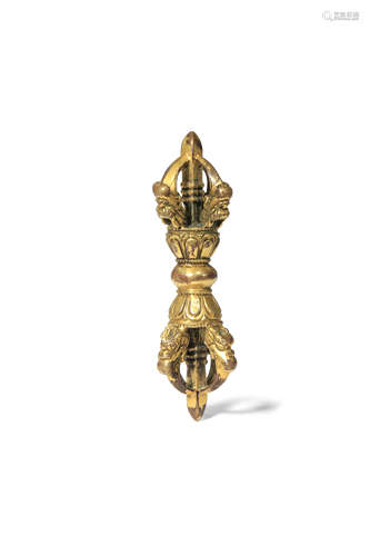 A SMALL TIBETAN GILT-BRONZE VAJRA PROBABLY 18TH CENTURY The central knop flanked by bands of