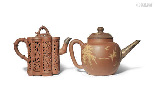 TWO CHINESE YIXING TEAPOTS AND COVERS 18TH CENTURY One decorated in slip with bamboo, pine, bats,