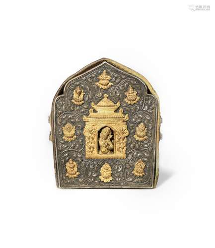 A TIBETAN PARCEL-GILT COPPER TRAVELLING BUDDHIST SHRINE, GAU 18TH/19TH CENTURY The metal casing