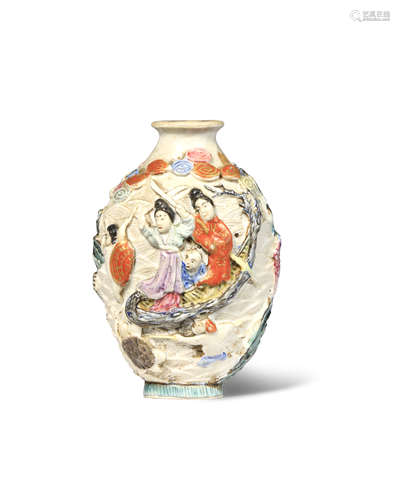 A CHINESE FAMILLE ROSE MOULDED SNUFF BOTTLE 19TH CENTURY The flattened ovoid body decorated with