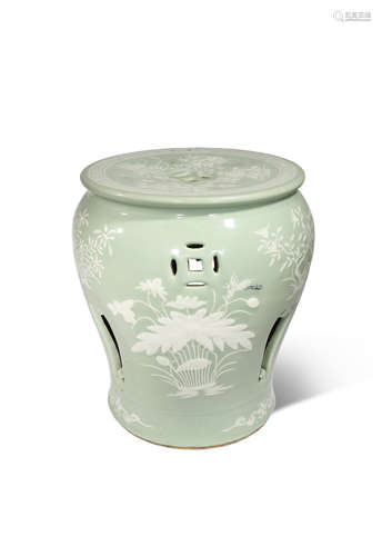 A CHINESE CELADON GLAZED SLIP-DECORATED 'FOUR GENTLEMEN' GARDEN SEAT LATE QING DYNASTY The top