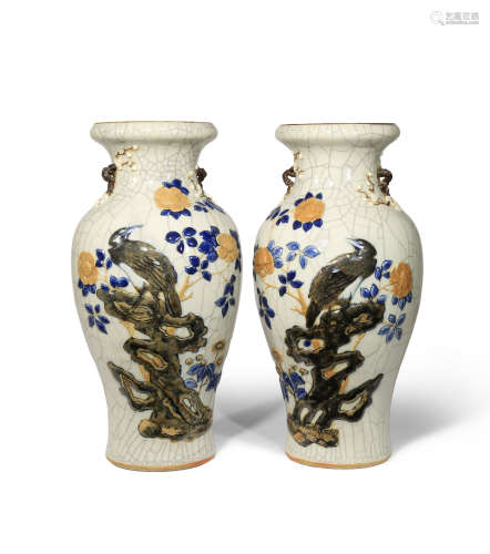 A PAIR OF CHINESE CRACKLE GLAZED BALUSTER VASES LATE QING DYNASTY Moulded in relief with birds