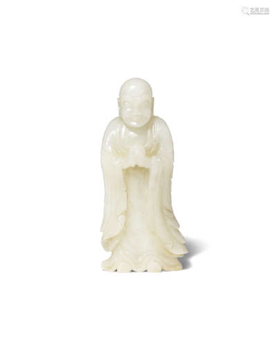 A CHINESE PALE CELADON JADE CARVING OF A LUOHAN QING DYNASTY OR LATER Standing wearing flowing