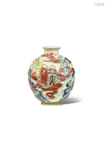 A CHINESE FAMILLE ROSE MOULDED SNUFF BOTTLE 19TH CENTURY The flattened ovoid body decorated in