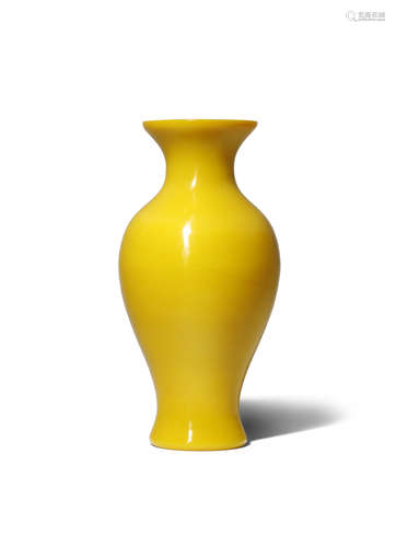 A CHINESE BEIJING YELLOW GLASS VASE QING DYNASTY The baluster-shaped body with a waisted flared