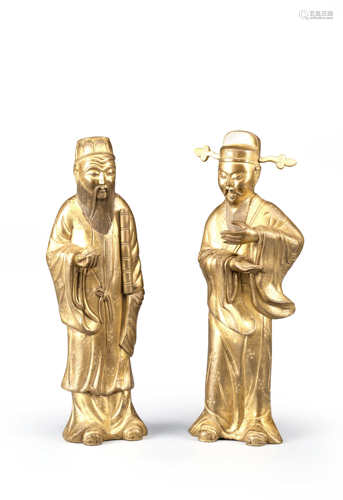 A PAIR OF CHINESE GILT-BRONZE FIGURES OF IMMORTALS PROBABLY LATE QING DYNASTY Each wearing long