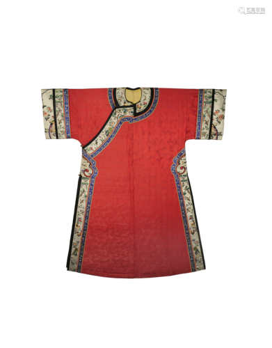 A CHINESE RED-GROUND DAMASK SILK MANCHU LADY'S ROBE LATE 19TH CENTURY The red silk subtly