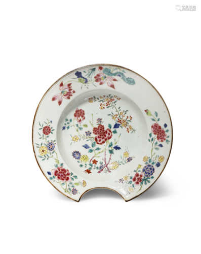 A CHINESE FAMILLE ROSE BARBER'S BOWL QIANLONG 1736-95 Of circular form with a cut out section in the