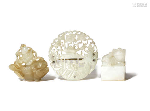 THREE CHINESE PALE CELADON JADE CARVINGS QING DYNASTY AND LATER Comprising: a seal with a surmount