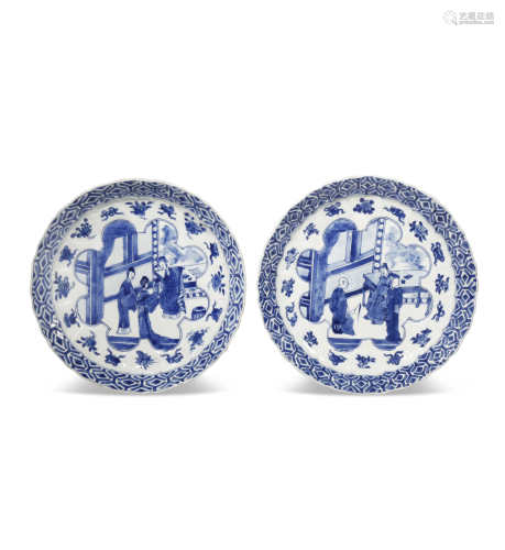 TWO CHINESE BLUE AND WHITE MOULDED DISHES KANGXI 1662-1722 Each painted with a figural scene