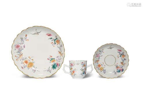 A CHINESE EUROPEAN-DECORATED TREMBLEUSE CUP, SAUCER AND SAUCER DISH QIANLONG 1736-95 Finely