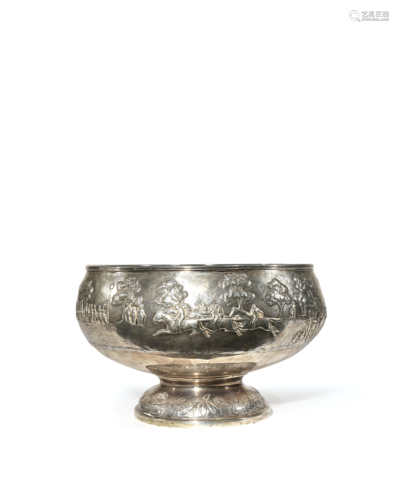 A LARGE INDIAN SILVER FOOTED 'HORSE RACING' BOWL 19TH CENTURY Decorated in repouss? with a